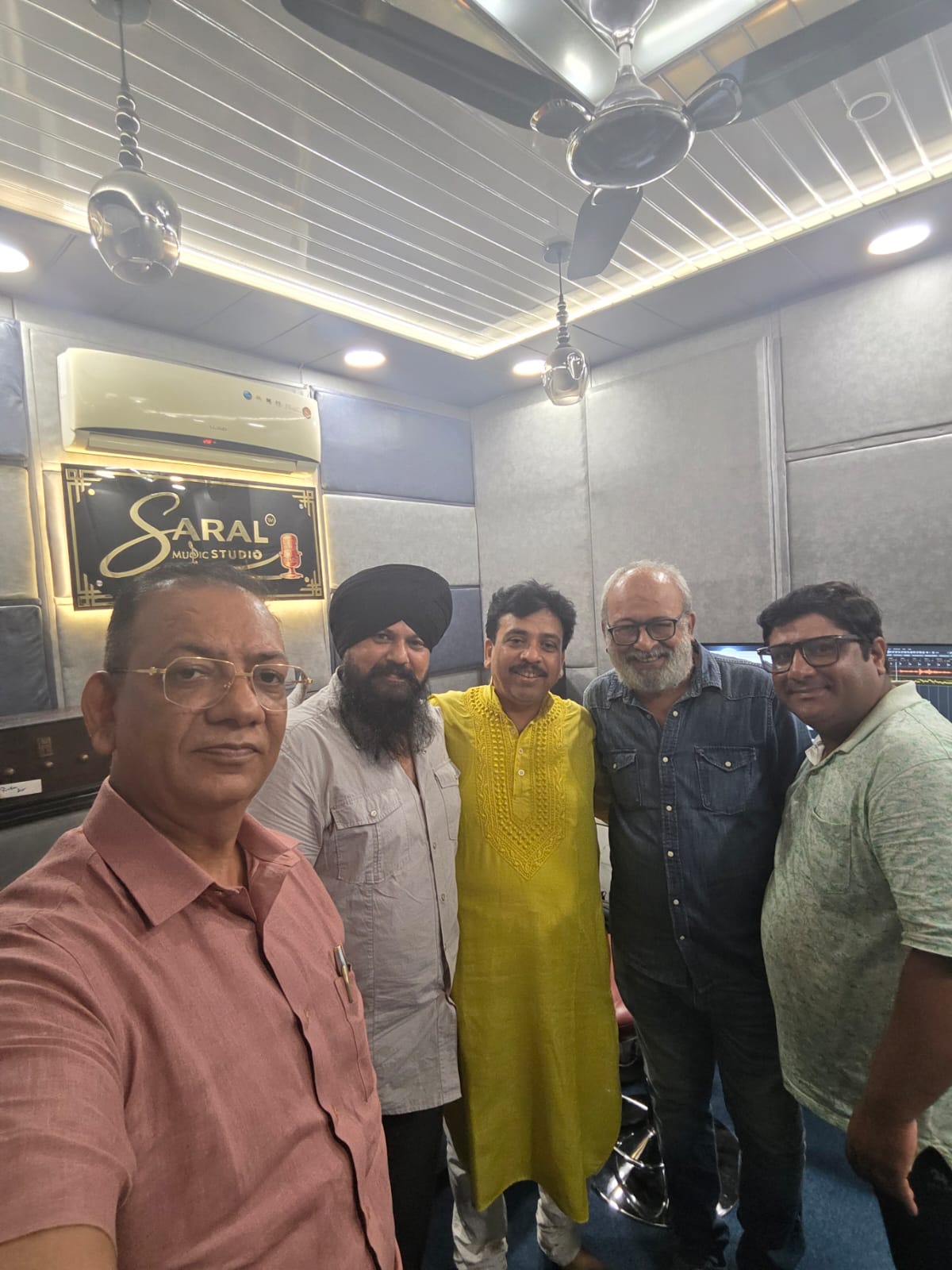 Team with tabla during a studio visit